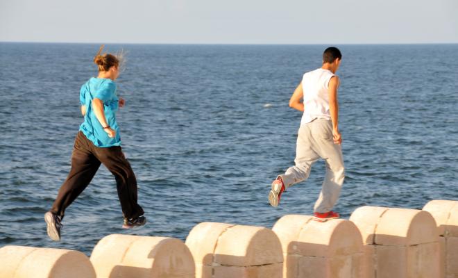 People running on a wall in Alexandria