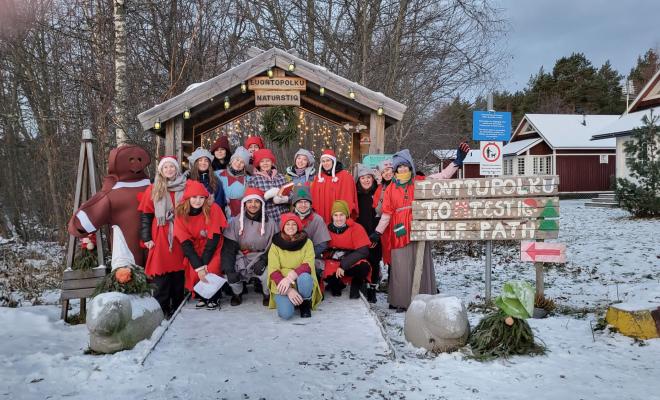 A group of people wearing elf clothes